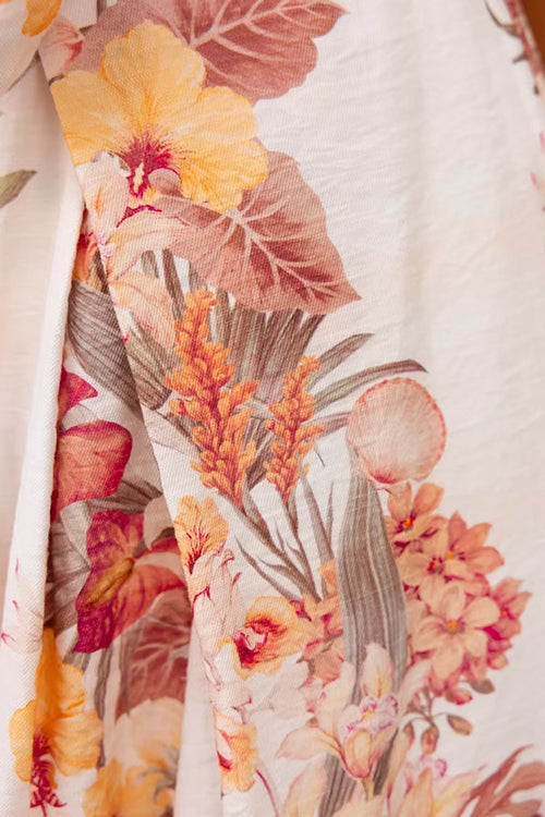 Vestido sin tirantes con estampado floral, lazo en la cintura y abertura en la pierna, corte de pierna ancha