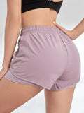 Pantalón corto deportivo elástico con bolsillos para mujer, running y yoga