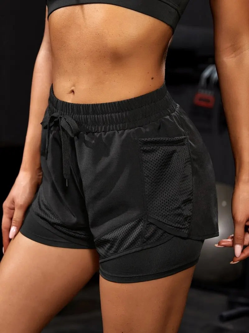 Pantalón corto deportivo elástico con bolsillos para mujer, running y yoga
