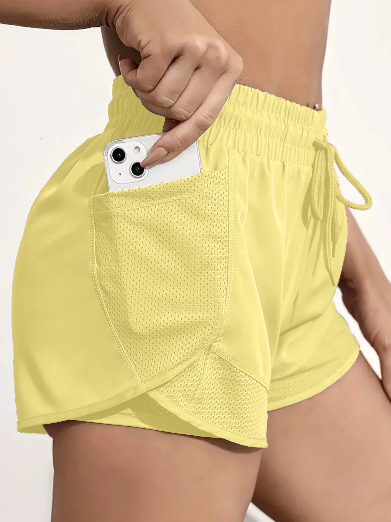 Pantalón corto deportivo elástico con bolsillos para mujer, running y yoga