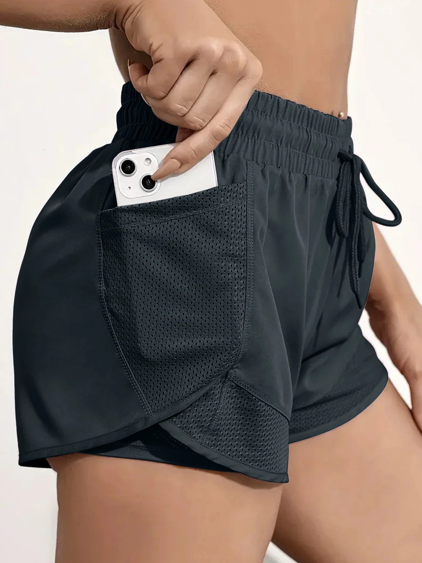 Pantalón corto deportivo elástico con bolsillos para mujer, running y yoga