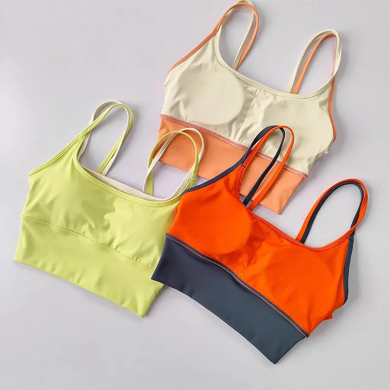 Sujetador deportivo de tirantes para mujer, yoga y running, con relleno extraíble