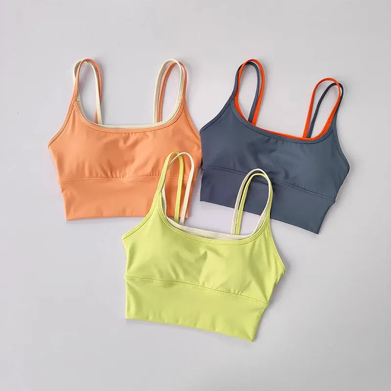 Sujetador deportivo de tirantes para mujer, yoga y running, con relleno extraíble
